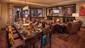 Dining area and great room with cozy fireplace