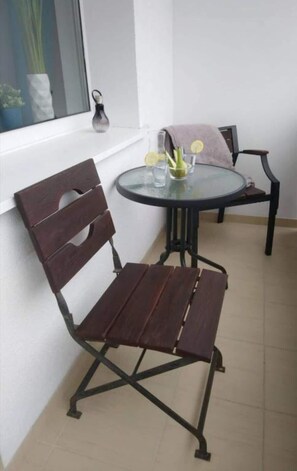 The balcony's peaceful ambiance is ideal for unwinding. 