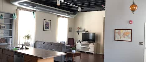 2 bedroom loft downtown condo with high ceilings, tasteful art, modern features.