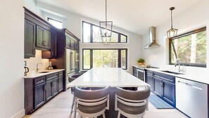 A bright, clean kitchen with everything you need to prepare your favorite meals