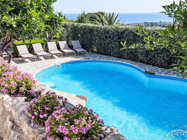 Water, Plant, Flower, Property, Sky, Azure, Swimming Pool, Natural Landscape, Tree, Vegetation