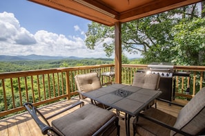 Gas Grill and Outdoor Dining Table under Roof for all-weather al fresco dining with a View!