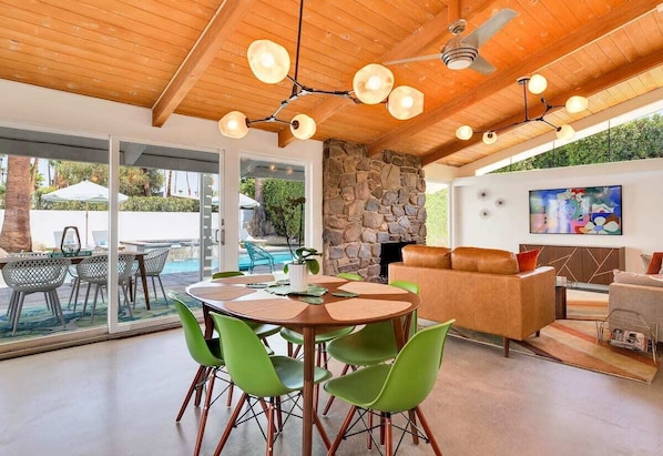 Great room with polished concrete floors, hand-laid stone fireplace