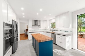 Brand-new kitchen, with Wolf induction cooktop and other high-end appliances