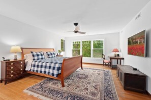 Primary bedroom: king bed and view over backyard. Adjoining boudoir.