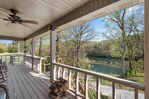Enjoy a cup of coffee or glass of wine overlooking the Norfork River