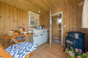 kitchenette and wood-effect stove