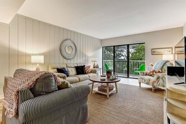 Plenty of Natural Light Coming In From Balcony Sliding Doors