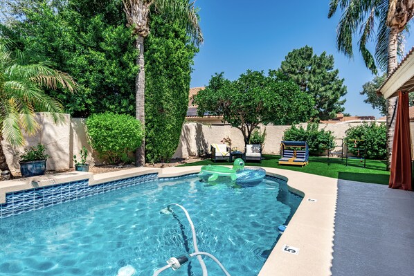 Poolside and kids play area.  Play, swim, lounge, repeat.