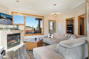 Relax In Front Of The Fireplace While Taking In the View