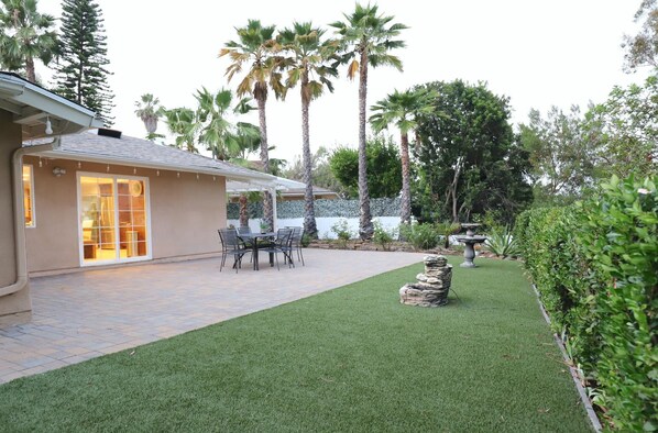 Enjoy this huge spacious green backyard.