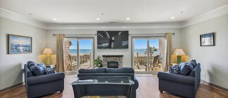Enjoy this oceanfront living room with your friends and family.