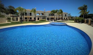 A beautful saltwater free form pool with wading steps, smaller pool for children