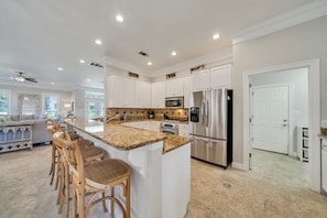 Beautifully updated kitchen with plenty of space to prepare and serve.