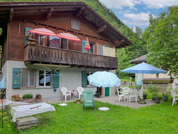 Plant, Property, Building, Cloud, Sky, Tree, Window, Table, Outdoor Furniture, Tent