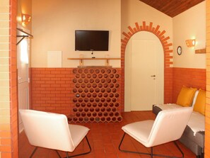 Furniture, Property, Building, Comfort, Interior Design, Flooring, Floor, Wood, Television, Living Room