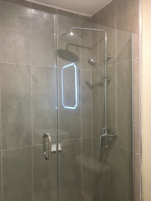 Bathroom glass enclosure shower with rain shower head 