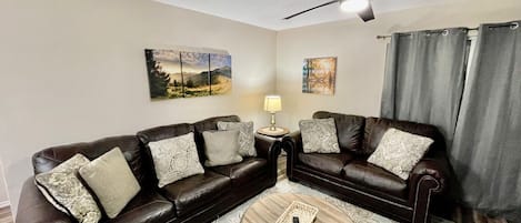 Sofa Sleeper and Love Seat in Family Room of Unit 1