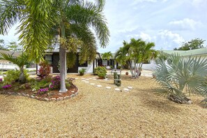 Front Yard with zero maintenance gravel ground cover.