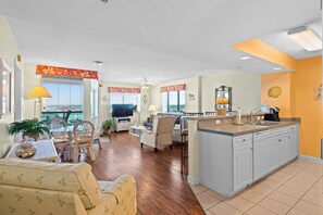 The spaciousness of this condo is enhanced by the open floor plan.