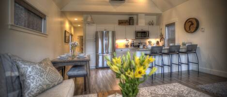 View facing kitchen and hallway. High Ceiling at Carpenter Cottage