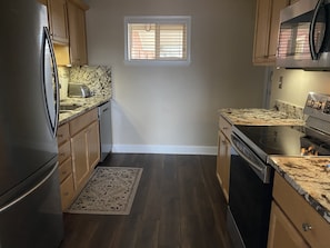 Kitchen with Dishwasher and Stove

