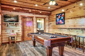 Recreation room with pool table, board games, new 4K smartTV, and Multigame arcade. Challenge your friends and family to a game or two to see who is going to do the dishes tonight ; )