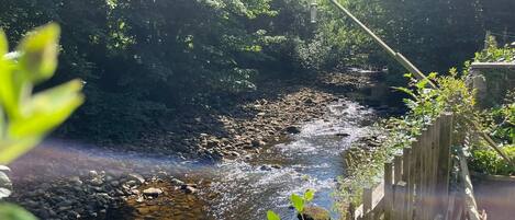 The Roeburn flows alongside the garden of the Riverside Tailor’s Cottage