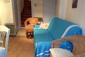 The lounge area of the ground floor room.