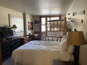 Master bedroom sleeps 5 with a twin over full bunk bed made w beetle kill pine.