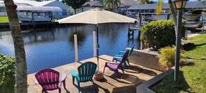 Enjoy the dock to relax or fish, you might spot a manatee in the canal too 