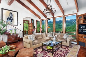 That is truly the view through the floor to ceiling windows in the living area of this wonderful vacation rental home!