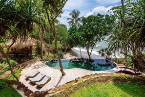 Swimming Pool perched above the beach