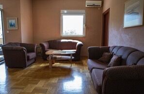 Living room with sofa bed.