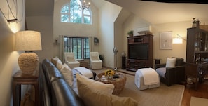 Open concept cathedral living room.