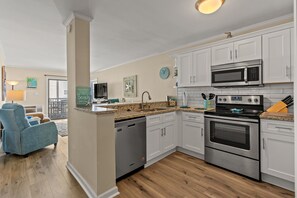 The family chef will love this updated kitchen with stainless steel appliances.