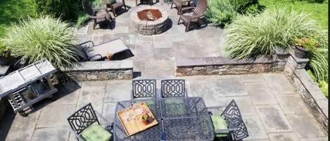backyard fire pit, seating area and grill