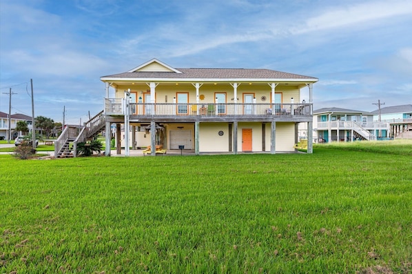 Welcome to our beach house. Please don't park on the grass or the street.