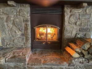 Wood burning fireplace. Wood and fire starters provided to guests.