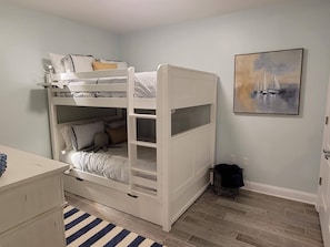 Bunkbed room.  Both top and bottom are full-size, and pullout twin-size trundlde