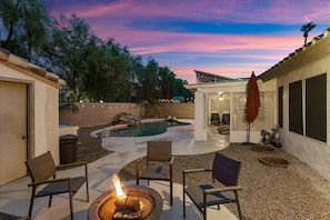 Imagine yourself relaxing around this firepit, surrounded by family and friends.