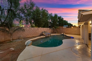 Enjoy the waterfall pool under the beautiful Arizona Sky!