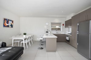 Open plan kitchen and dining