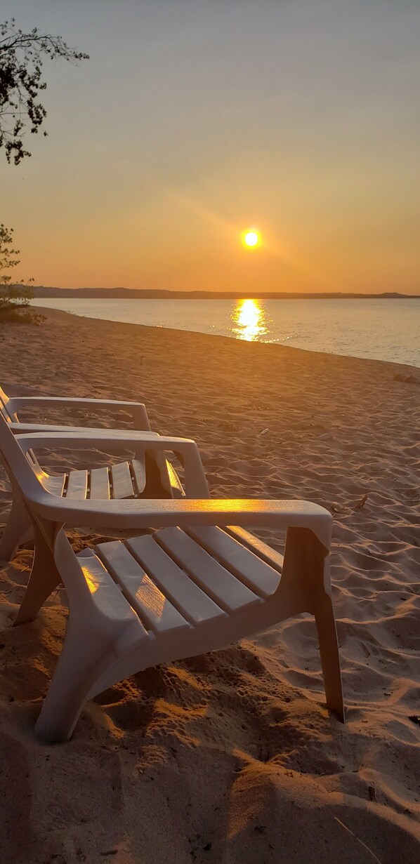 Sit back on your private beach and watch the sunset 