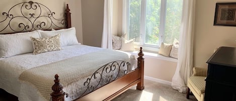 Main First Floor Bedroom (King bed). Toddler mattress located under bed.