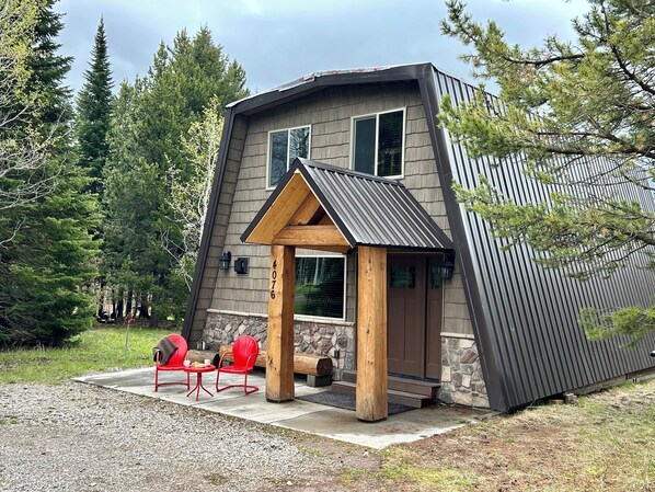 Front of Cabin with relaxing bistro seating.