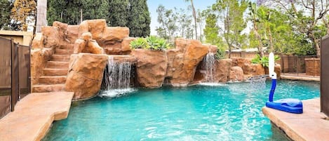 Gated Pool with rock-slide and water falls