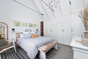 Our king sized bed makes this space a. divine place to relax. 