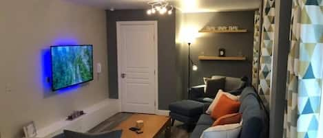 Living Area with 55 inch Smart HDTV