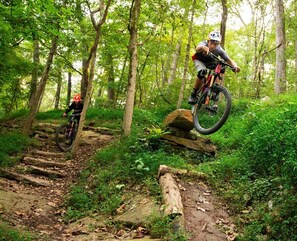 Located just 1/2-mile from Slaughter Pen Trails! Enjoy 40- plus miles of single-track trails for beginners & experts alike.